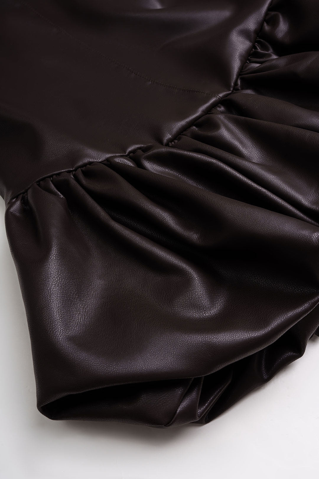 DressNovel Faux Leather Round Neck Ruched Hem Sleeveless Mini Dress